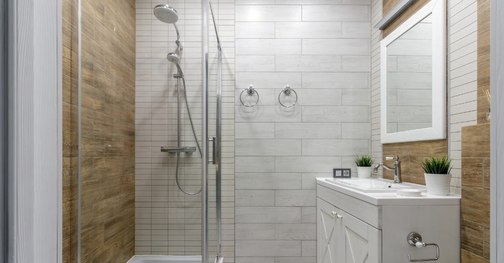 Featured Post Image - Why Everyone’s Ditching Walk-In Showers for Steamy Glass Boxes